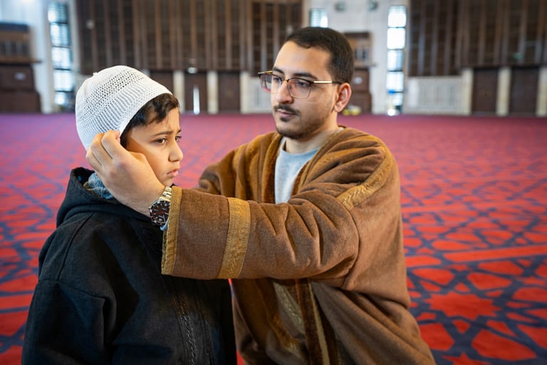 BOY Father Masjed Quran, a fine-art photograph by Ali Abu Ras
