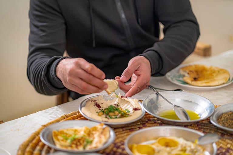 Family Ramadan Eftar Food Eating, a fine-art photograph by Ali Abu Ras