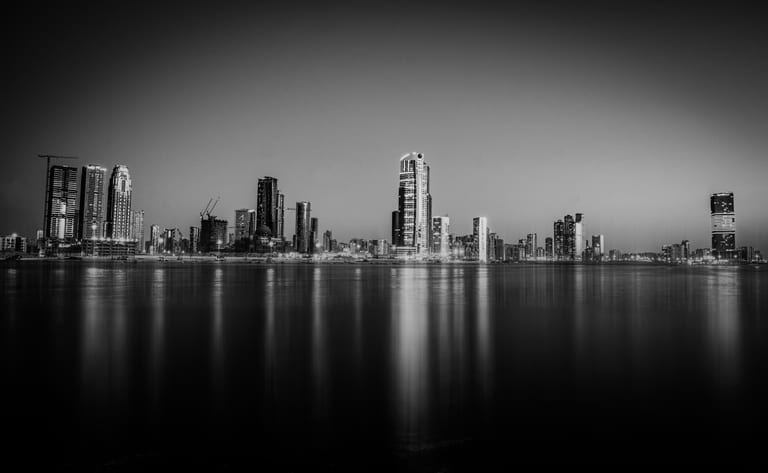 Dubai Alshareqa Building Night Expouer, a fine-art photograph by Ali Abu Ras