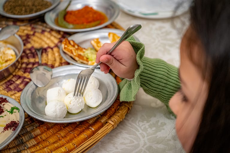 Family Ramadan Eftar Food Eating, a fine-art photograph by Ali Abu Ras