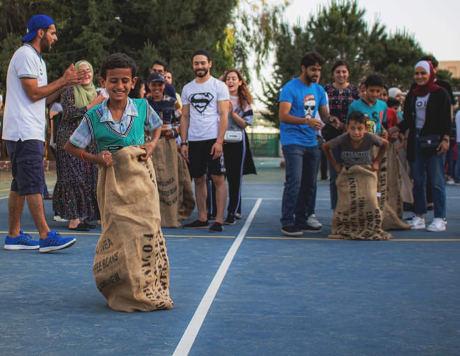 People Boys Playes, a fine-art photograph by Ali Abu Ras
