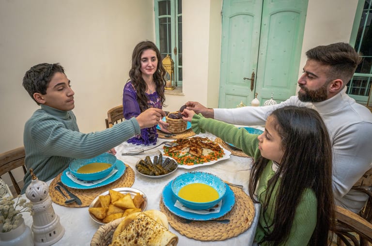 Family Ramadan Eftar Food Eating, a fine-art photograph by Ali Abu Ras