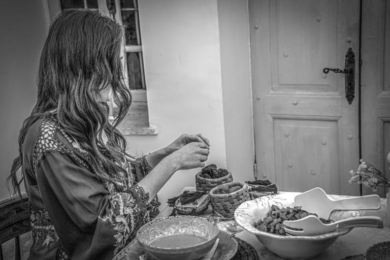 Ramadan Woman Noor Eftar Sohour, a fine-art photograph by Ali Abu Ras