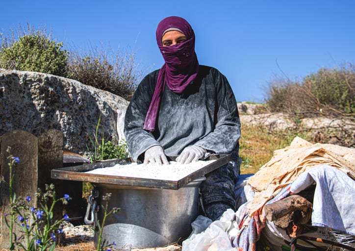 Woman Work Create Bread Outdoor Graesa, a fine-art photograph by Ali Abu Ras