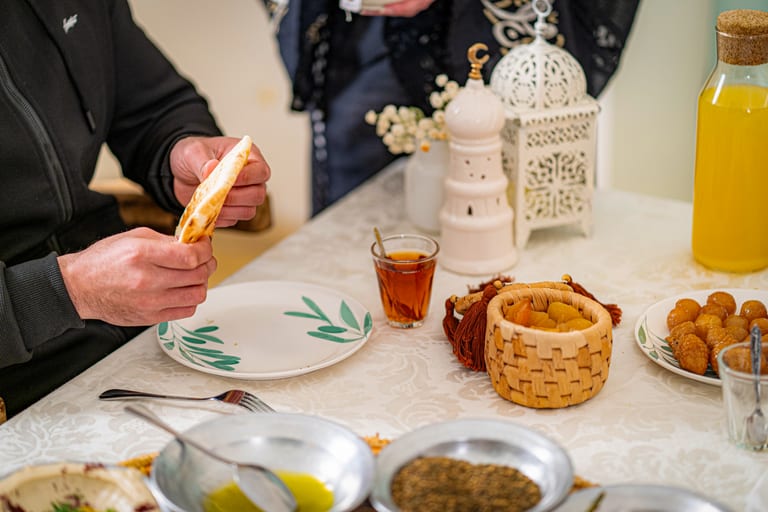 Family Ramadan Eftar Food Eating, a fine-art photograph by Ali Abu Ras