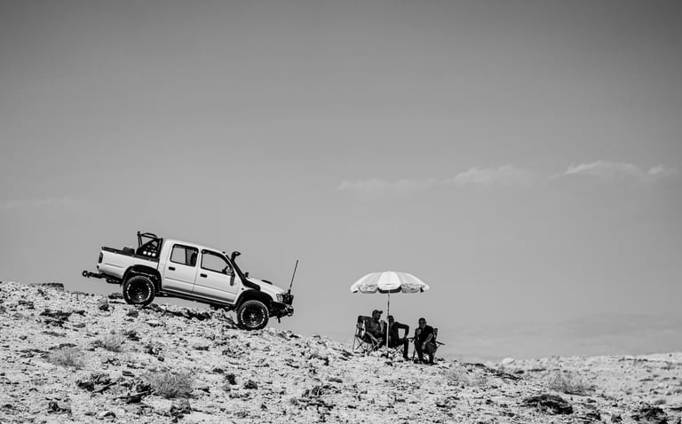 4 X 4 CAR RED Deadsea, a fine-art photograph by Ali Abu Ras