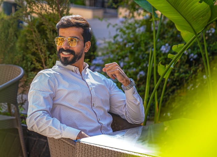 MAN Laptop Table Outdoor, a fine-art photograph by Ali Abu Ras