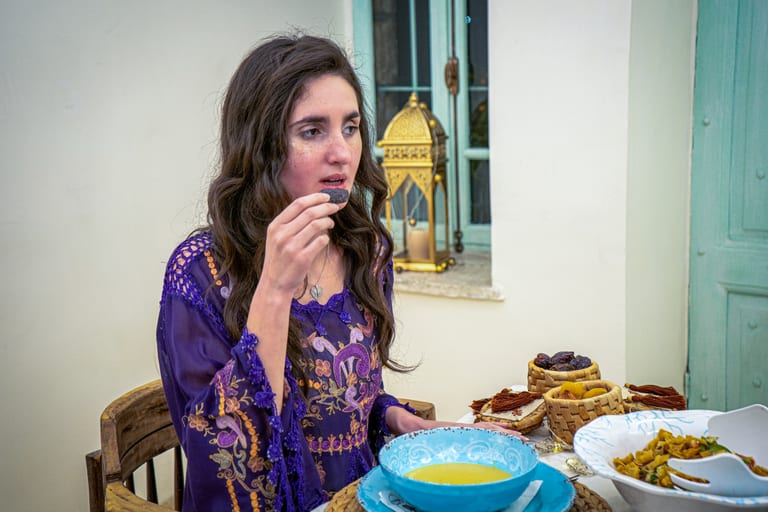 Ramadan Woman Noor Eftar Sohour, a fine-art photograph by Ali Abu Ras