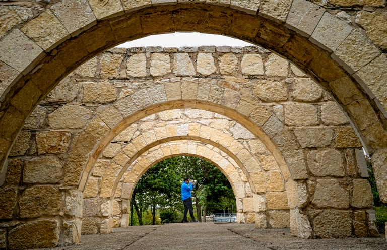 MAN Saed Stand Photographyer Archies, a fine-art photograph by Ali Abu Ras