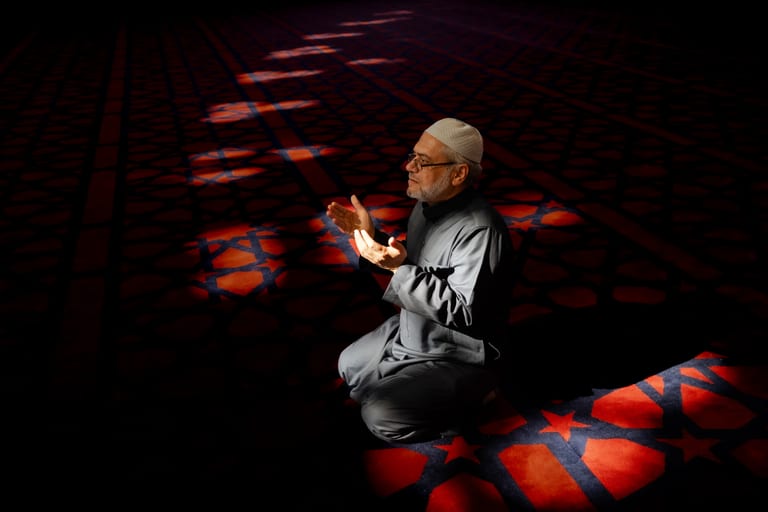MAN Read Quran Masjid Ramadain, a fine-art photograph by Ali Abu Ras