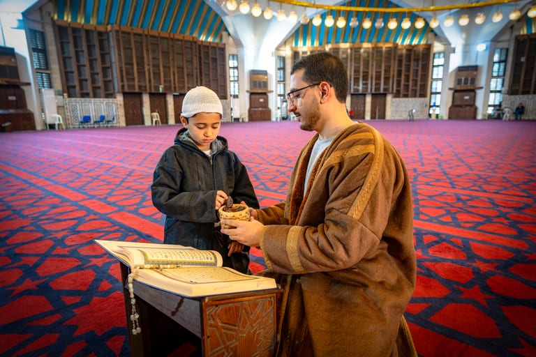 BOY Father Masjed Quran, a fine-art photograph by Ali Abu Ras