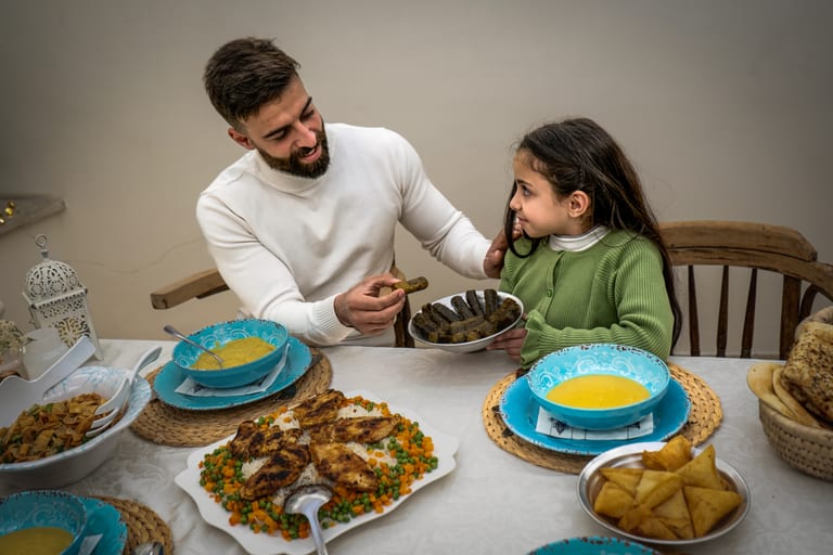 Family Ramadan Eftar Food Eating, a fine-art photograph by Ali Abu Ras