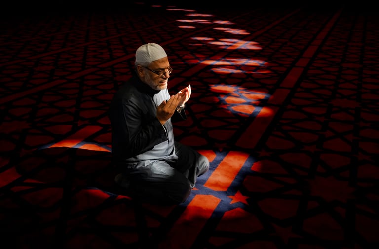 MAN Read Quran Masjid Ramadain, a fine-art photograph by Ali Abu Ras