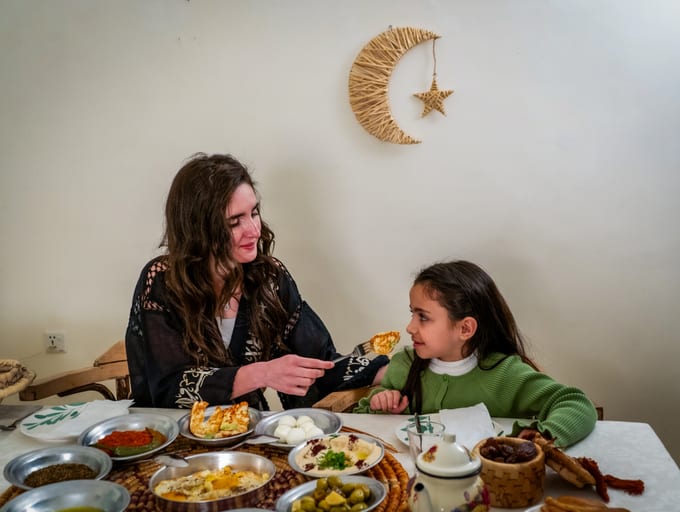 Ramadan Woman Noor Eftar Sohour, a fine-art photograph by Ali Abu Ras