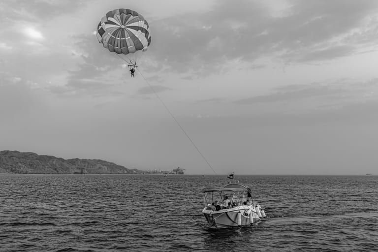 Aqaba Boat Beach Shore, a fine-art photograph by Ali Abu Ras