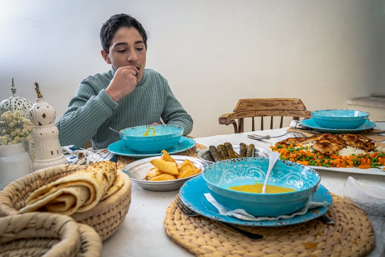 Family Ramadan Eftar Food Eating, a fine-art photograph by Ali Abu Ras