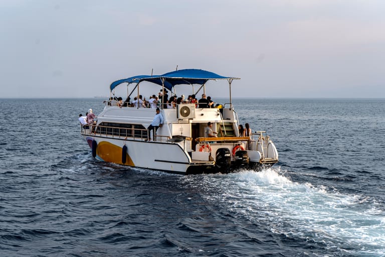 Ship Boat Sunset Aqaba, a fine-art photograph by Ali Abu Ras