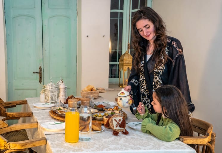 Ramadan Woman Noor Eftar Sohour, a fine-art photograph by Ali Abu Ras