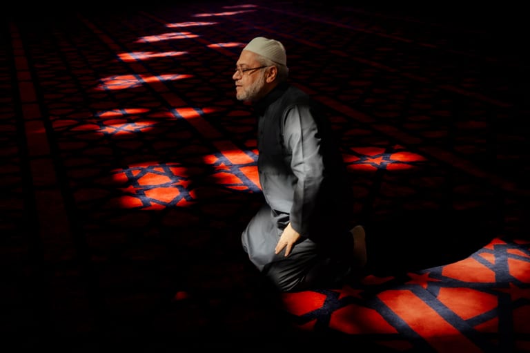 MAN Read Quran Masjid Ramadain, a fine-art photograph by Ali Abu Ras