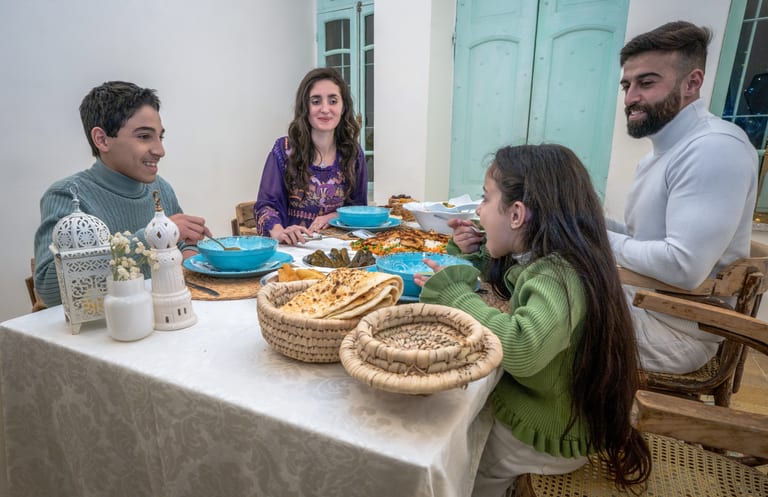 Family Ramadan Eftar Food Eating, a fine-art photograph by Ali Abu Ras