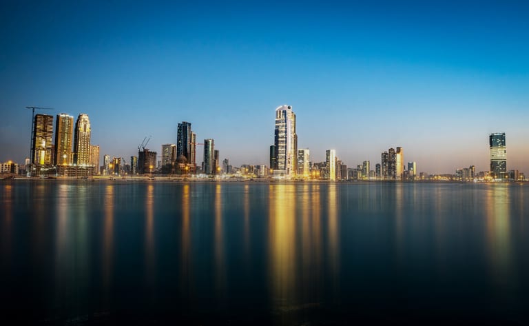 Dubai Alshareqa Building Night Expouer, a fine-art photograph by Ali Abu Ras