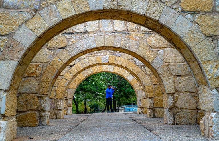 MAN Saed Stand Photographyer Archies, a fine-art photograph by Ali Abu Ras