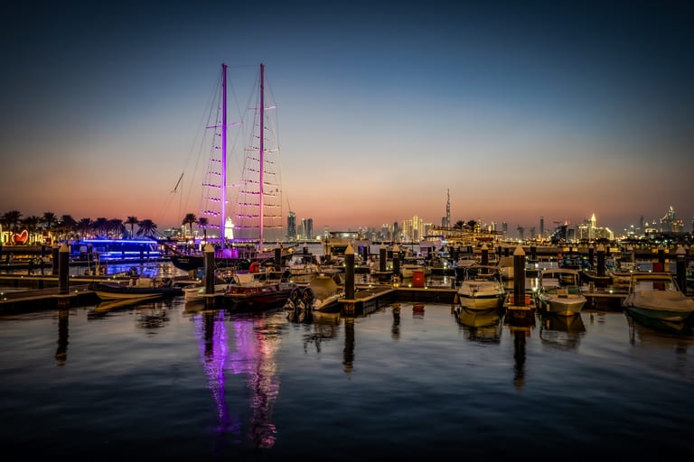 Cityscape Lights Boats Dubai, a fine-art photograph by Ali Abu Ras