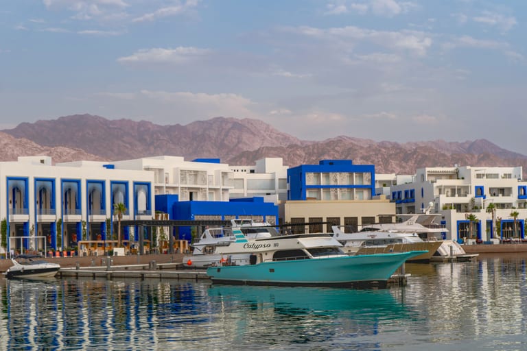 Aqaba Boat Beach Shore, a fine-art photograph by Ali Abu Ras