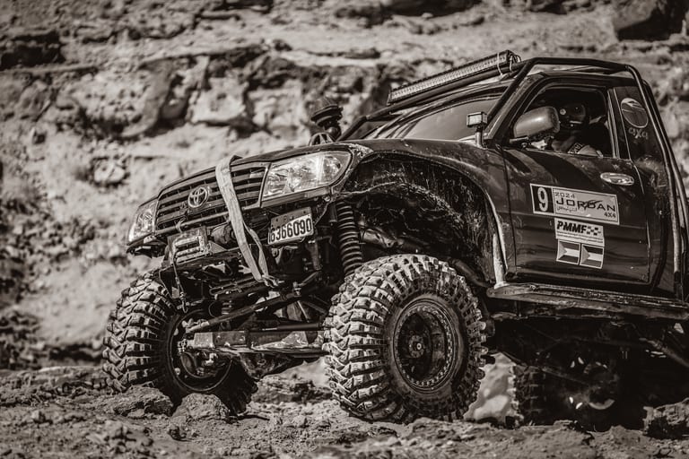 4 X 4 CAR RED Deadsea, a fine-art photograph by Ali Abu Ras