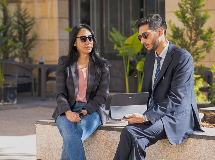 MAN Woman Laptop Table Outdoor, a fine-art photograph by Ali Abu Ras