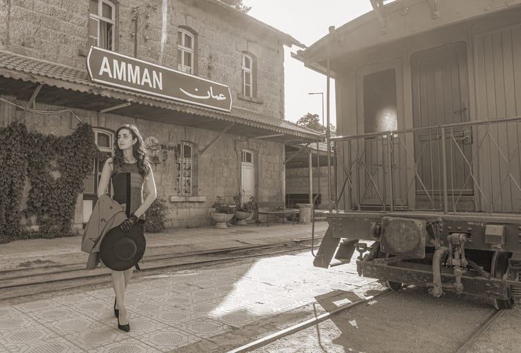 Noor RED Dress Train, a fine-art photograph by Ali Abu Ras
