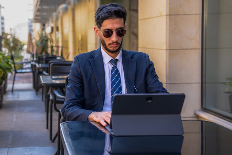 MAN Laptop Table Outdoor, a fine-art photograph by Ali Abu Ras