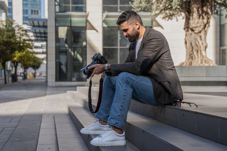 MAN Setting Camera, a fine-art photograph by Ali Abu Ras