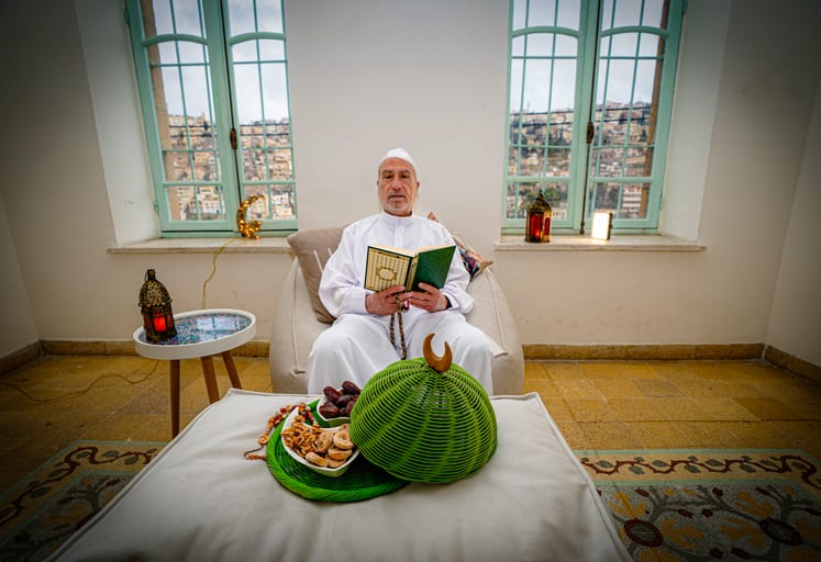 MAN OLD Read Quran Ramadan City Background, a fine-art photograph by Ali Abu Ras
