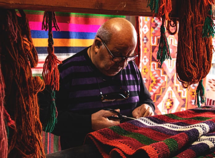 Madaba Market Carbets Store MAN, a fine-art photograph by Ali Abu Ras