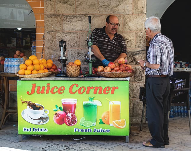 Madaba People Street Market MAN, a fine-art photograph by Ali Abu Ras