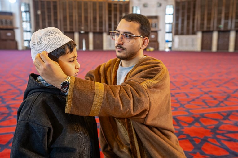 BOY Father Masjed Quran, a fine-art photograph by Ali Abu Ras