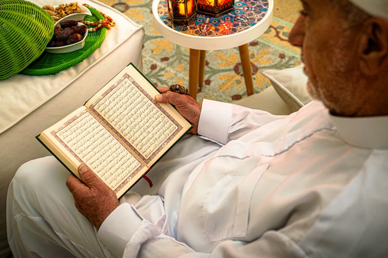 MAN OLD Read Quran Ramadan City Background, a fine-art photograph by Ali Abu Ras