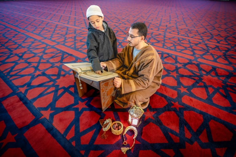 1 BOY Father Masjed Quran, a fine-art photograph by Ali Abu Ras