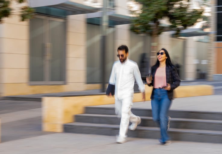 MAN Woman Walking, a fine-art photograph by Ali Abu Ras