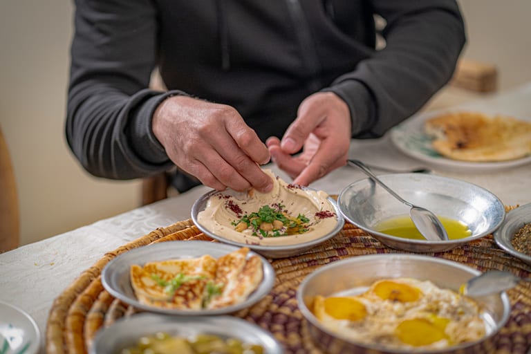 Family Ramadan Eftar Food Eating, a fine-art photograph by Ali Abu Ras