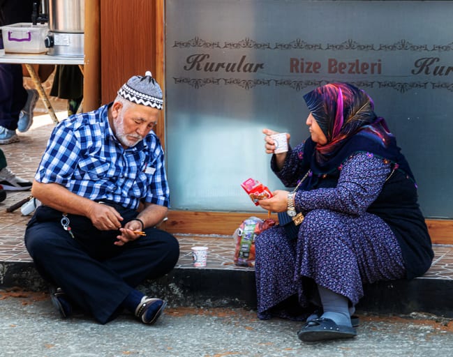 People Street EAT Drink OLD MAN Woman, a fine-art photograph by Ali Abu Ras