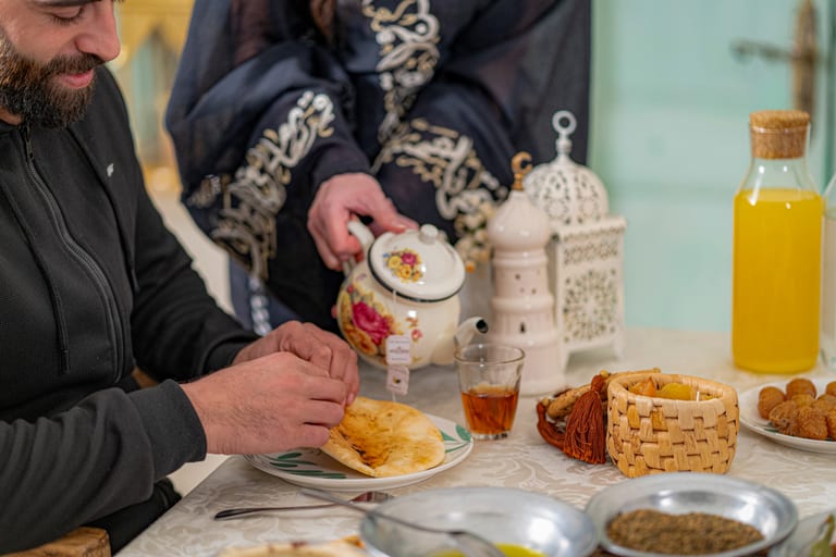 Family Ramadan Eftar Food Eating, a fine-art photograph by Ali Abu Ras