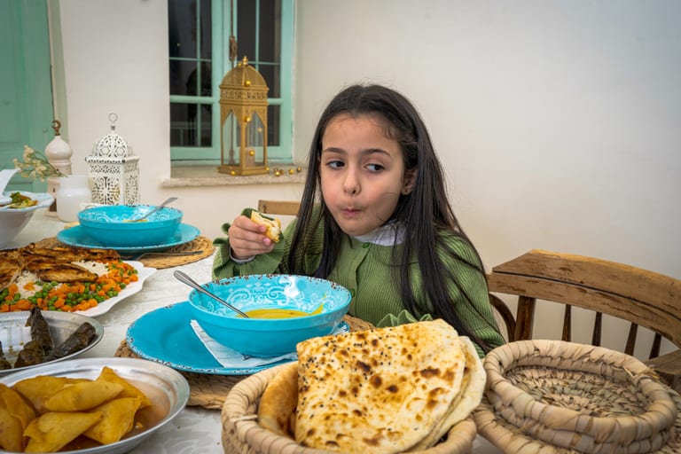 Family Ramadan Eftar Food Eating, a fine-art photograph by Ali Abu Ras