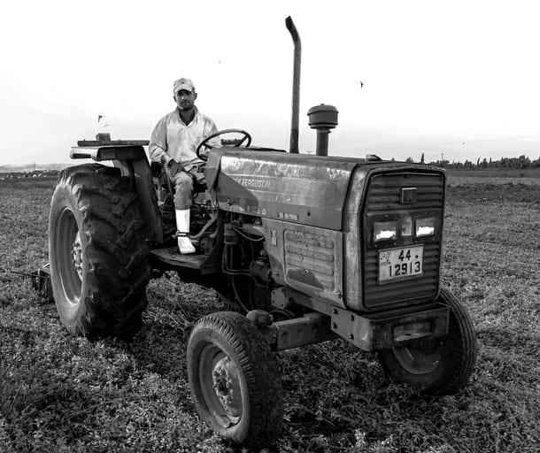 Farmer Trucktor Hashmiah, a fine-art photograph by Ali Abu Ras