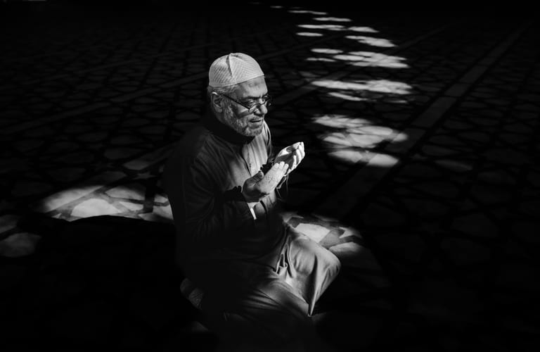 1 MAN Read Quran Masjid Ramadain, a fine-art photograph by Ali Abu Ras