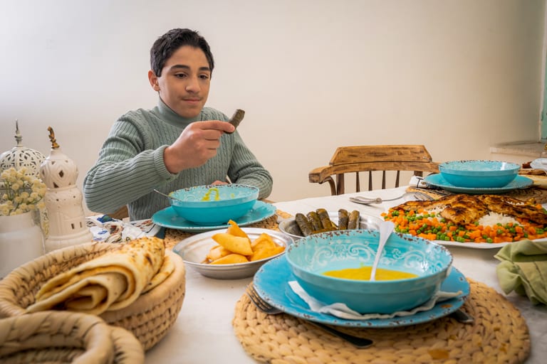 Family Ramadan Eftar Food Eating, a fine-art photograph by Ali Abu Ras